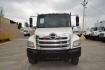 2012 WHITE HINO 338 with an HINO J08E-VB 8L 260HP engine, 6SPD MANUAL transmission, located at 9172 North Fwy, Houston, TX, 77037, (713) 910-6868, 29.887470, -95.411903 - 24FT FLATBED, 33,000LB GVWR ,98" WIDE , TOOL BOX, 90 GALLON FUEL TANK, SPRING RIDE, COLD A/C , CRUISE CONTROL, POWER WINDOWS & LOCKS - Photo#1